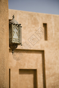 艾因在阿联酋迪拜Al Ain宫博物馆Al Ain宫博物馆的墙上特写孔灯背景