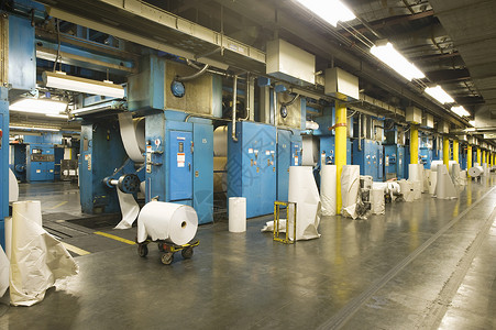 一家报纸厂的内地观点出版控件材料机械仓库天花板报纸蓝色命令机器背景图片