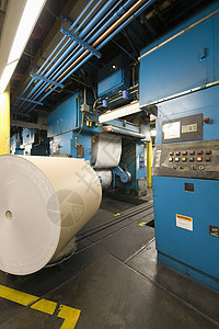 一家报纸厂的内地观点材料仓库造纸打印出版印刷职场报纸生产按钮背景图片