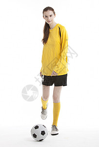 单足球素材年轻女足球运动员在白人背景下踢球的肖像 女子足球运动员背景