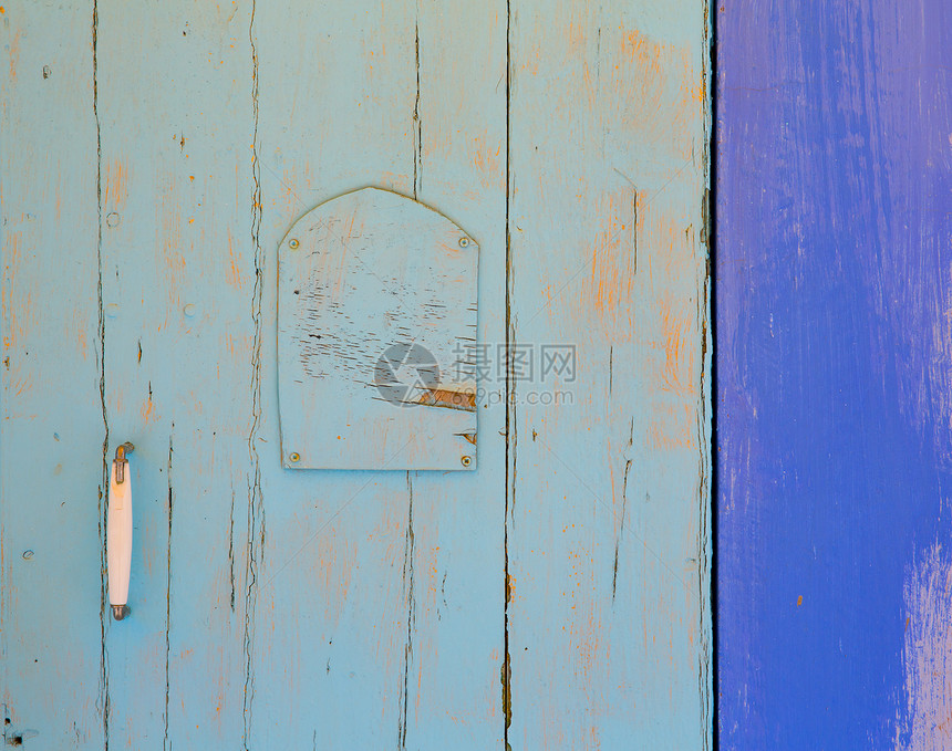 巴利阿里群岛的地中海蓝色门详细细节控制板木材回收松树线条建筑木板风化古董硬木图片