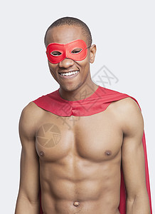 穿着彩色超级英雄穿着超级超英雄服装 脸色灰暗笑的无领男子肖像背景