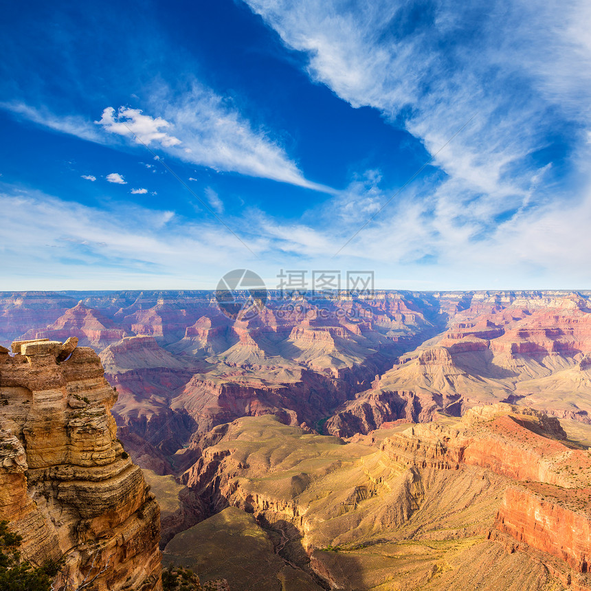 亚利桑那大峡谷国家公园蓝色山脉悬崖地平线橙子编队峡谷太阳天空岩石图片