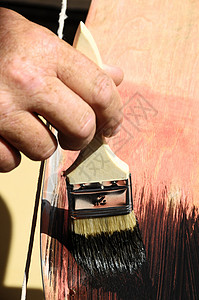 恢复旧式滑板刷子古董木板画家工具滑冰运动孩子绘画木头背景图片