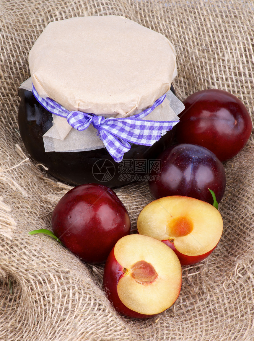 普拉姆贾姆黄色饮食褐色养护季节紫色玻璃罐李子油纸甜食图片