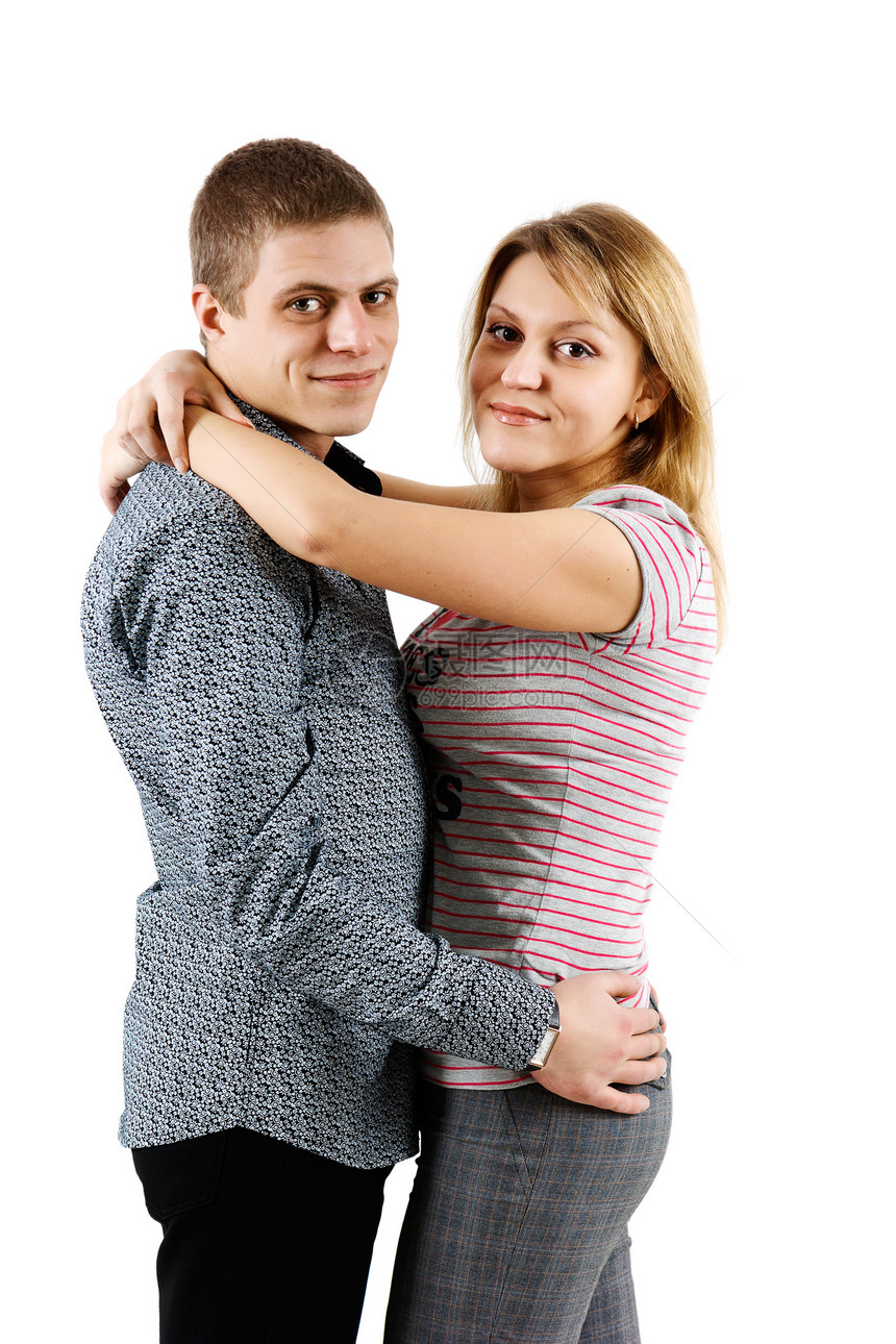 快乐的年轻夫妇男朋友拥抱微笑女性男人成人工作室男性白色女朋友图片