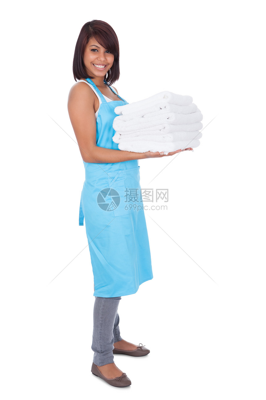 以毛巾微笑的女仆美丽房子家务职业家庭打扫金发女孩女性工人图片
