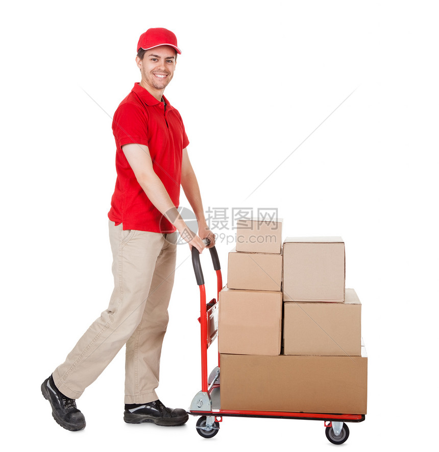 送货员 带一车箱纸板男人盒子服务微笑载体邮递员卡车派遣纸盒图片