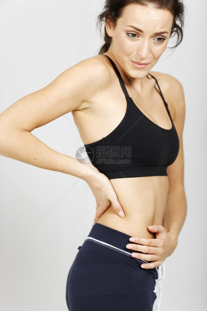身体健康的妇女训练调色手臂疼痛女孩运动痛苦女士身体健身房图片