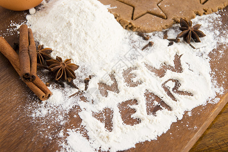 徐福记糖果面粉上的刻记     新年肉桂庆典粮食香料礼物桌子数字香草滚筒小吃背景