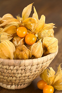 酸浆异国小吃亚热带情调浆果食物橙子醋栗水果篮子高清图片