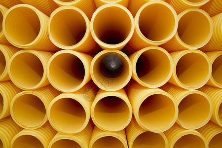 塑料管物体商业黄色画幅背光塑料重工业理念摄影管子背景图片