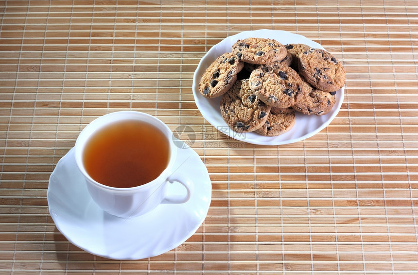 茶杯和饼干食物甜点巧克力棕色盘子糕点杯子小吃木头飞碟图片