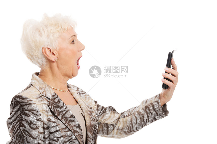 一位使用手机的老优雅女士头发技术工作室细胞祖父奶奶老年成人祖父母长老图片