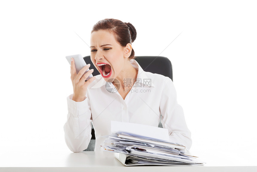 美丽的女商务人士坐着老板办公室职业愤怒商业手机女士微笑正装管理人员图片