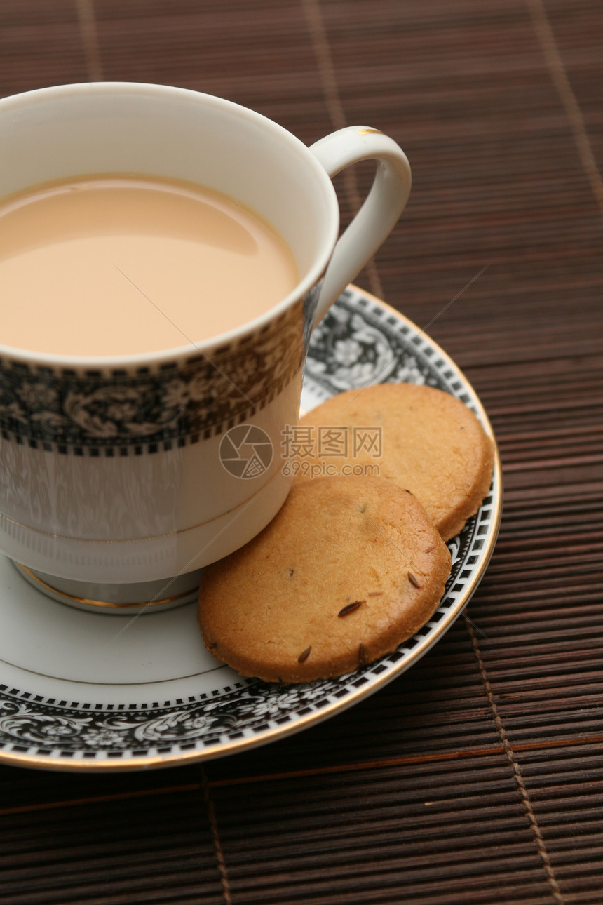 一杯茶和饼干陶瓷早餐饮料食物甜点蛋糕面包奢华美食杯子图片