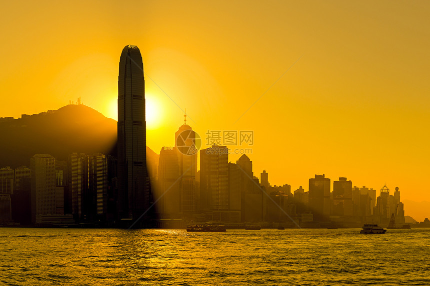 香港市的休丽花风景港口商业城市阳光日落建筑天际金融海景图片