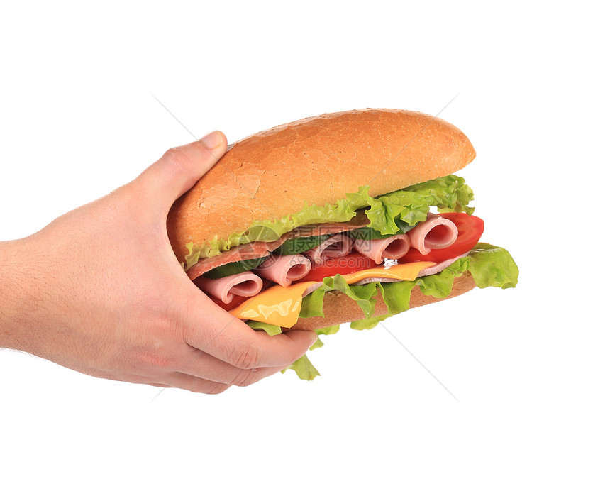 手拿着法式面包三明治蔬菜火腿芝麻垃圾小吃食物面包熏制沙拉家禽图片
