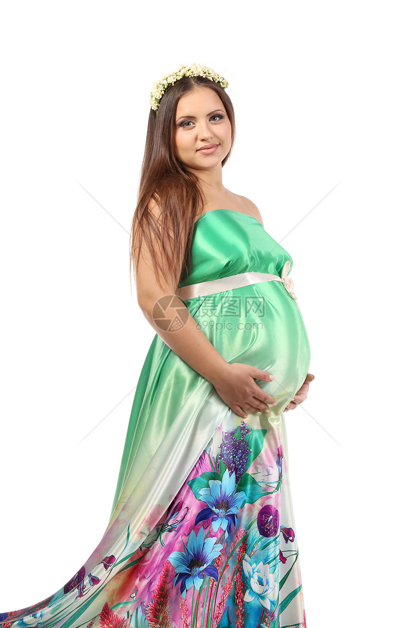 美丽的年轻怀孕妇女女性胸部手臂生活腹部婴儿裙子身体女性化丝带图片