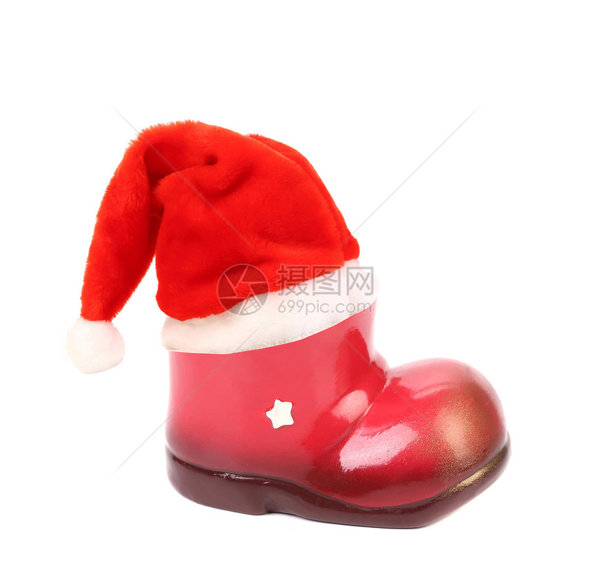 圣诞老人的帽子在Xmas靴子上图片
