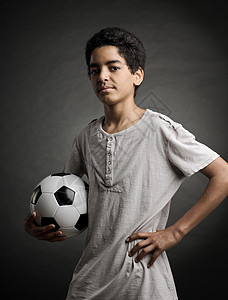 青少年足球足球运动员男生天赋种族运动影棚男孩孩子青年文化背景图片