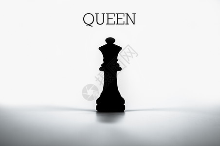 贴上女王的身号标签竞赛国际商业游戏灰色丢弃棋圣孤独比赛白色背景图片