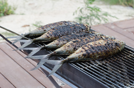 烧烤鱼食物野餐烹饪海鲜黑色炙烤烧伤背景图片