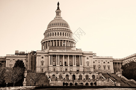 美国国会大厦建筑圆顶翅膀直流电建筑学棕褐色历史背景图片