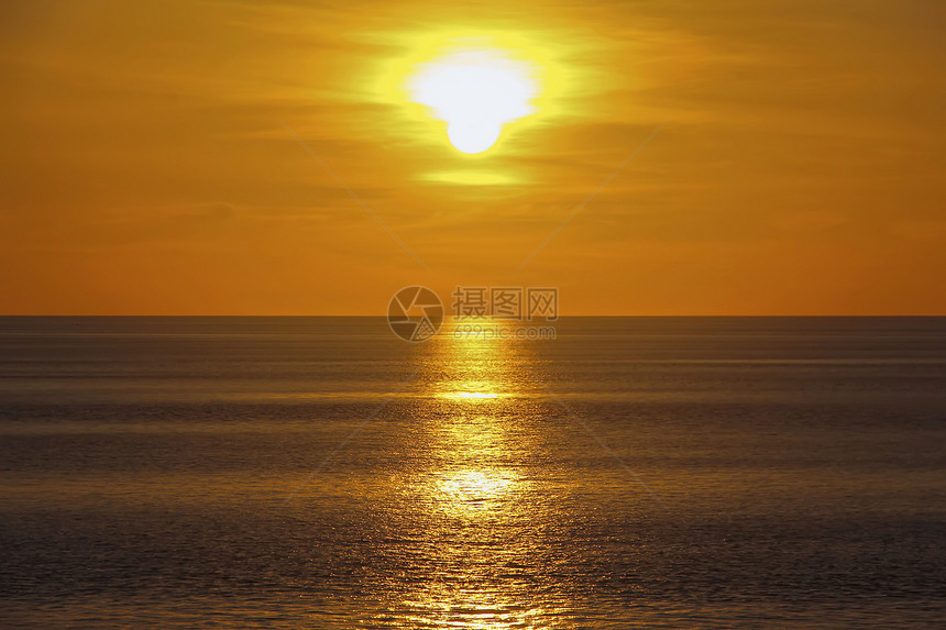 海洋中的日落地平线蓝色天堂天空橙子阳光太阳海岸日出风景图片