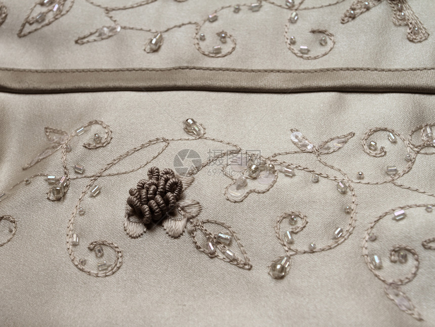 结婚礼服细目装饰品仪式魅力宏观刺绣女性裙子工艺宝石衣服图片