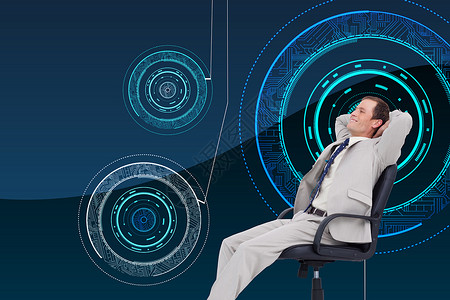 坐在椅子上的商务人士的侧视面图像综合成像计算技术领带计算机夹克旋转椅商务圆圈人士蓝色背景图片