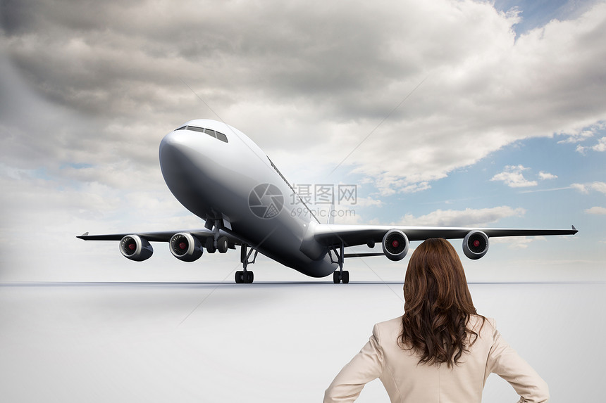 商业女商务人士的复合图像背靠着镜头站立地面航空女性思维双手夹克着陆职业旅行假期图片
