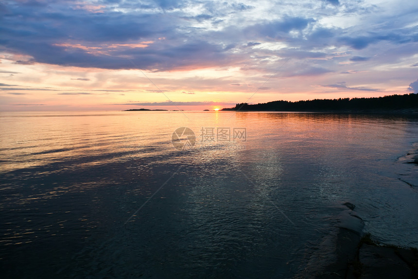 海上日落海洋阳光海岸海滩晴天旅行橙子地平线假期天空图片