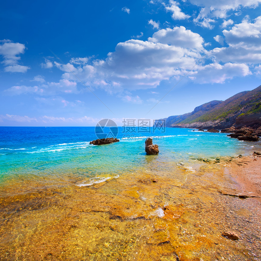 西班牙的轮状岩石海滩波纹地标海浪景点海洋支撑天气旅行环境海岸图片