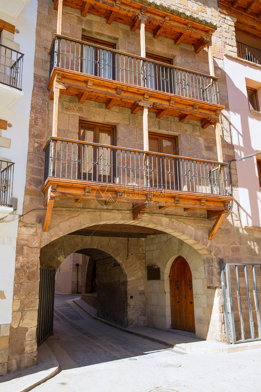 石墙村的拱门正方形旅行别墅入口建筑岩石石墙阳台建筑学图片