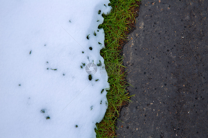 沿草地草原线在路上下雪图片