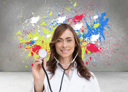 使用听诊器的快乐医生综合图像服务专注飞溅棕色听力蓝色女性计算机绘图专家背景图片