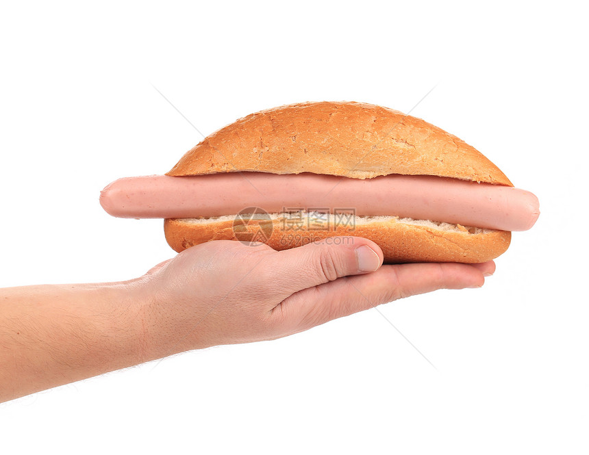 手握着大热狗垃圾食物美食香肠包子图片
