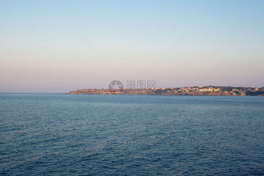 海景岩石日落建筑学海浪绿色石头悬崖白色蓝色水平图片