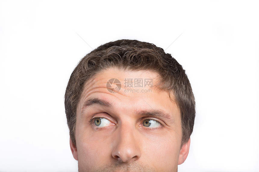 一个绿眼人拉眉毛的近身男性头发男人棕色眼睛图片