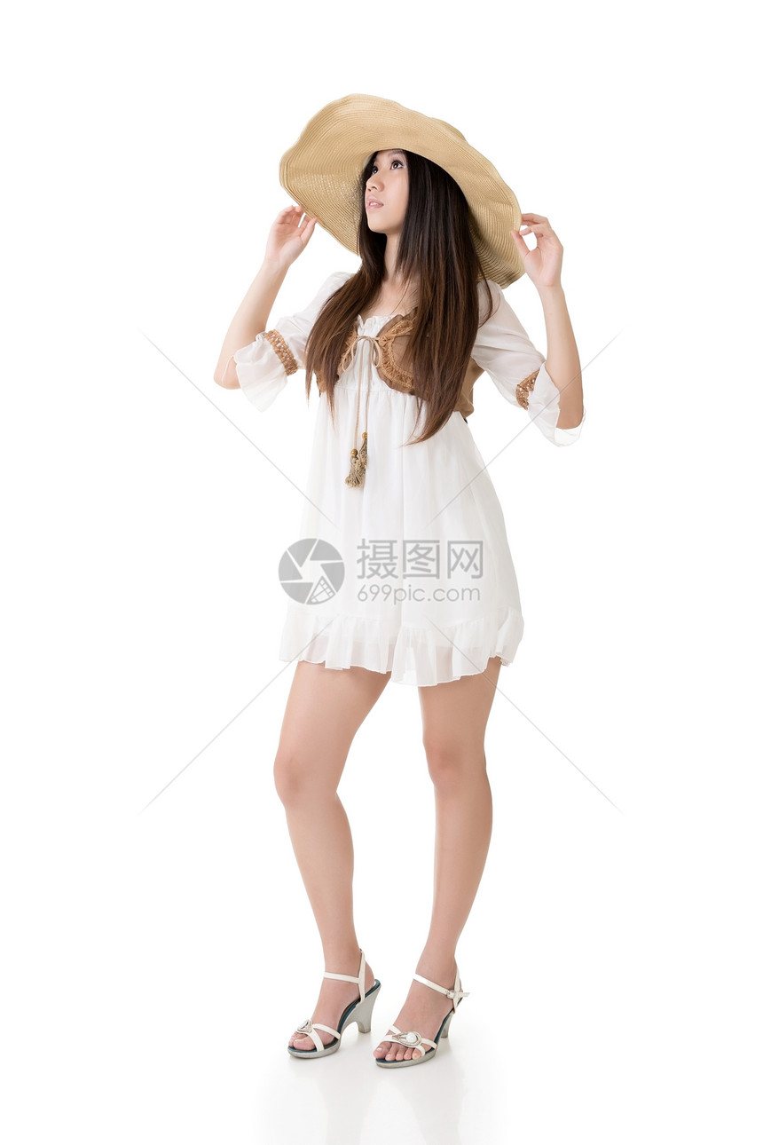 年青亚洲女性女孩高跟鞋帽子青年白色工作室女士姿势裙子冒充图片