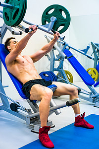 带有模拟器的正文构造器成人训练建设者重量男性手臂二头肌活动运动员男人背景图片