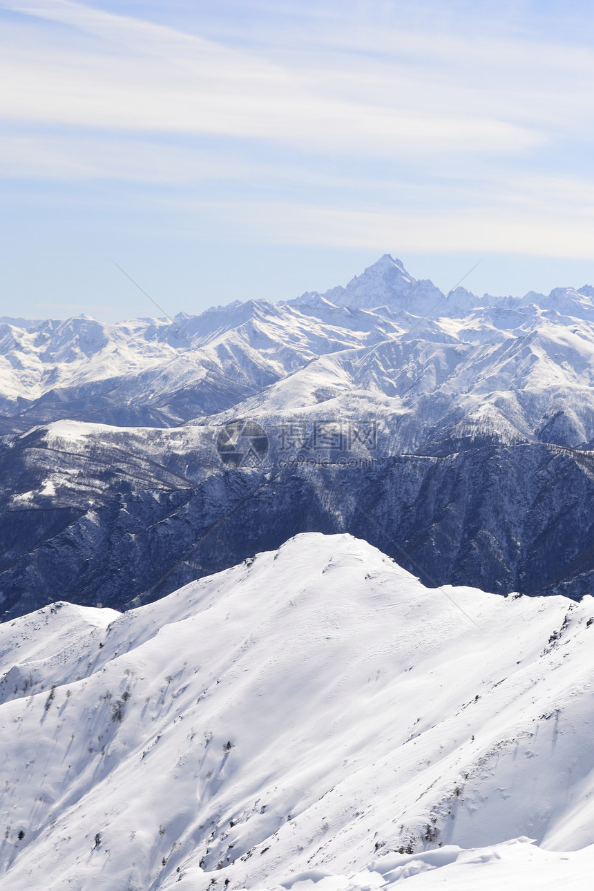 白滑雪斜坡运动风景勘探山脉蓝色山峰阳光全景季节冰川图片