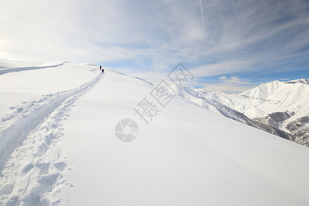 技术熟练冰川天空荒野山脉活动勘探滑雪雪鞋冒险愿望背景图片