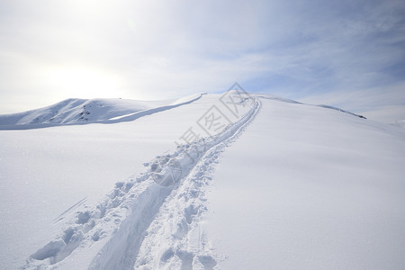 技术熟练愿望运动山脉滑雪粉雪远足活动雪鞋成就荒野背景图片