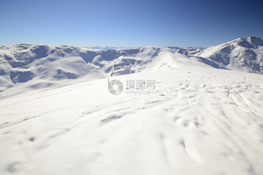 维索山的冬季风景岩石荒野地区全景山峰冒险滑雪季节冰川勘探图片