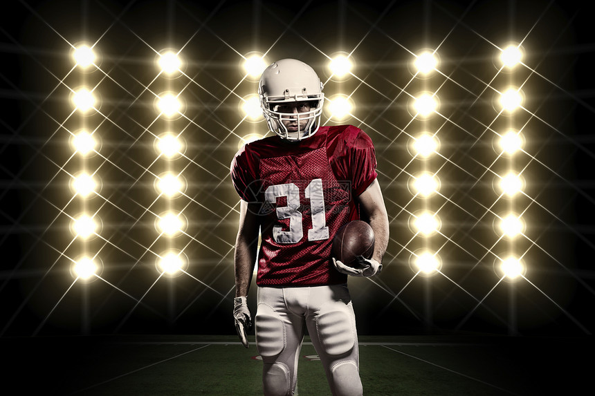 足球运动员体育白色红色影棚男人头盔体育场竞技制服职业图片