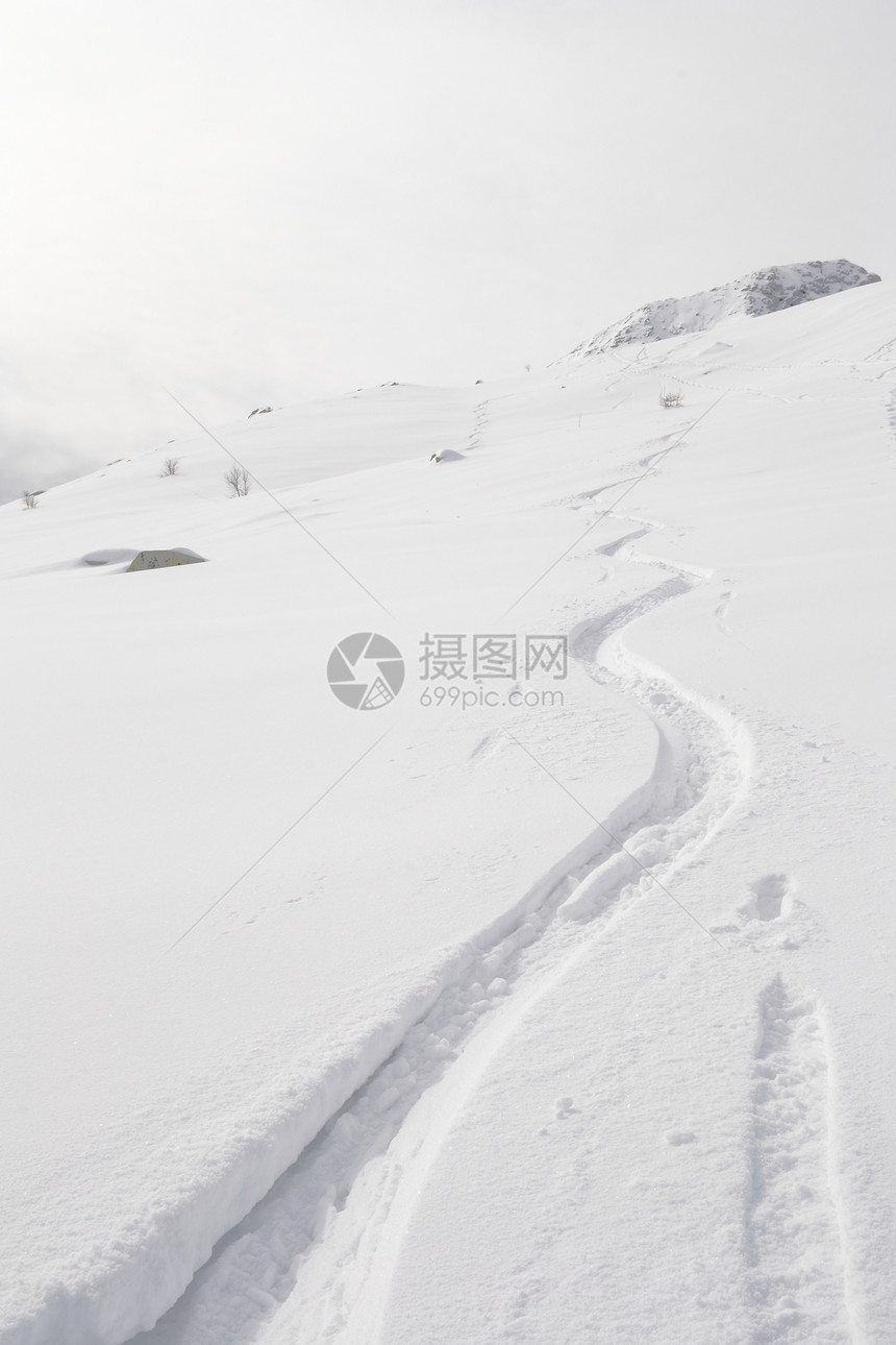 享受粉雪地区愿望极端运动移动逆境成就地形冰川天空图片