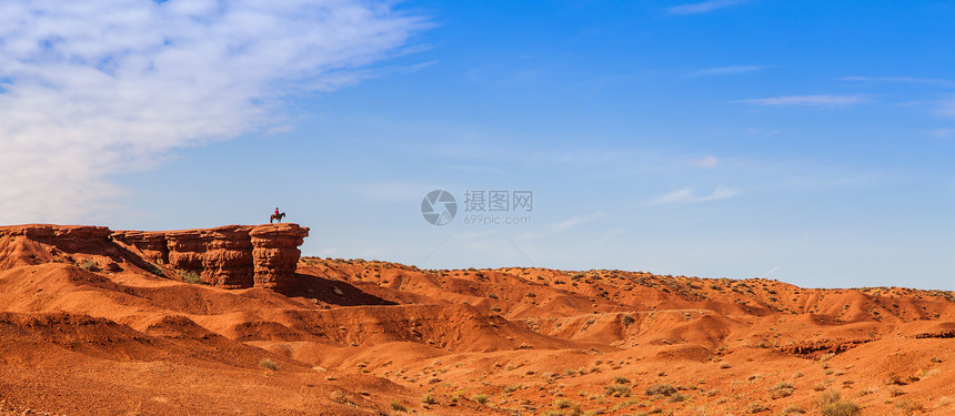 古迹谷橙子牛仔国家土地天空红色岩石旅行地平线沙漠图片