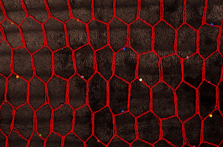 非洲非洲结构纺织品亚麻手工网格水平编织棉布红色画幅手工业背景图片